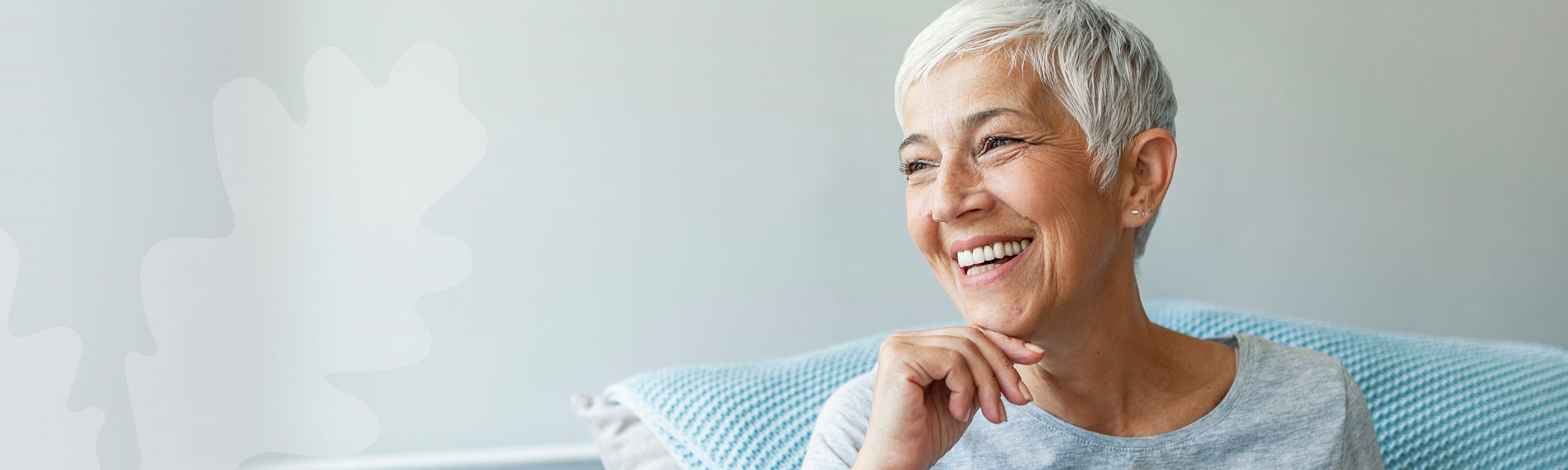 Smiling couple with dental implants